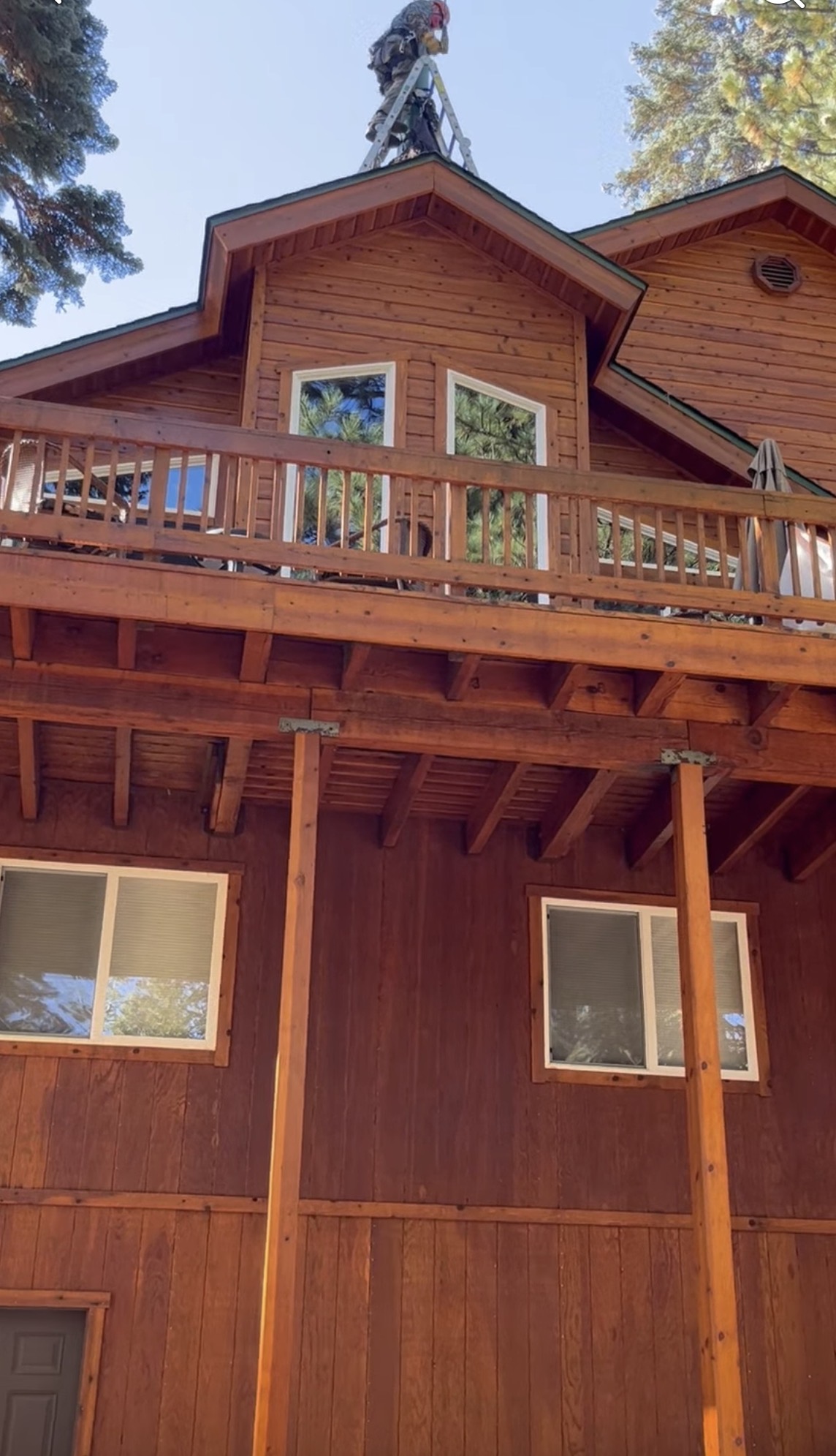 Working above a mountain home.