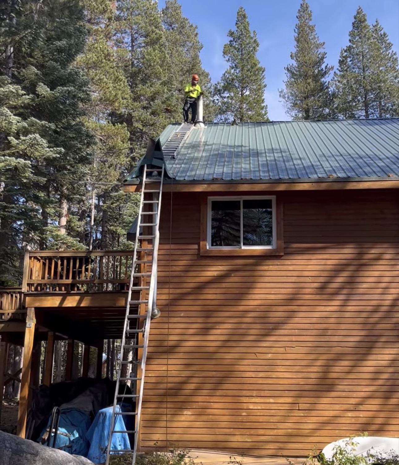 Ladder access to a metal roof.